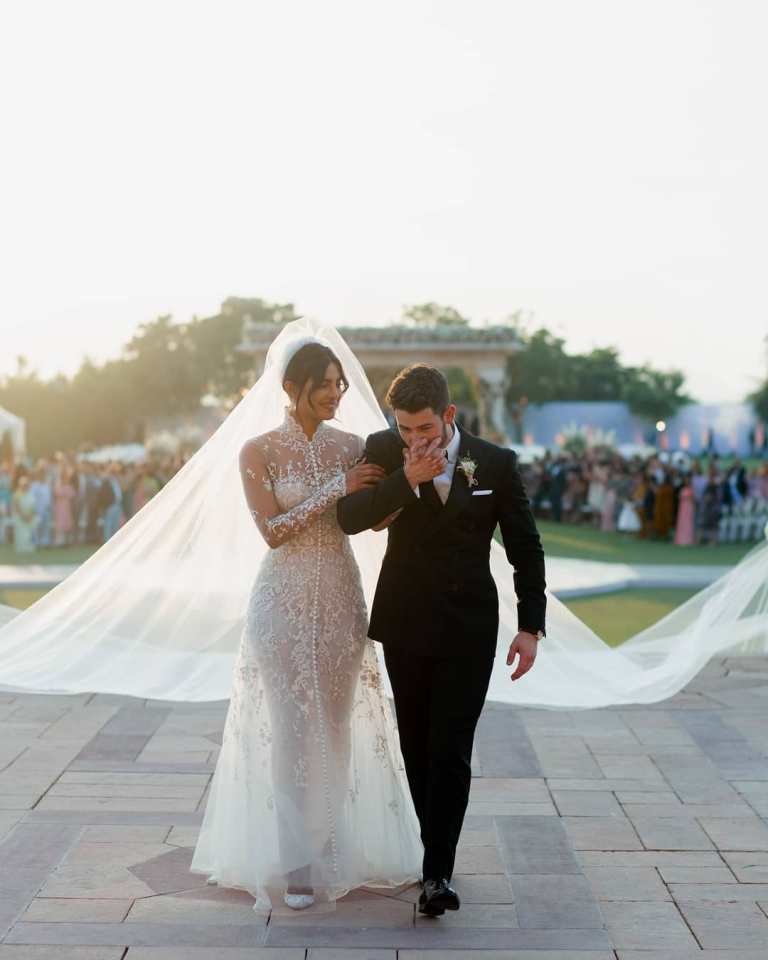 Nickyanka christain ceremony hindu ceremony Ralph Lauren bride groom season Priyanka Chopra Nick Jonas wedding marriage jodhour bollywood Hollywood gown designer party guest wedding dress royal wedding  