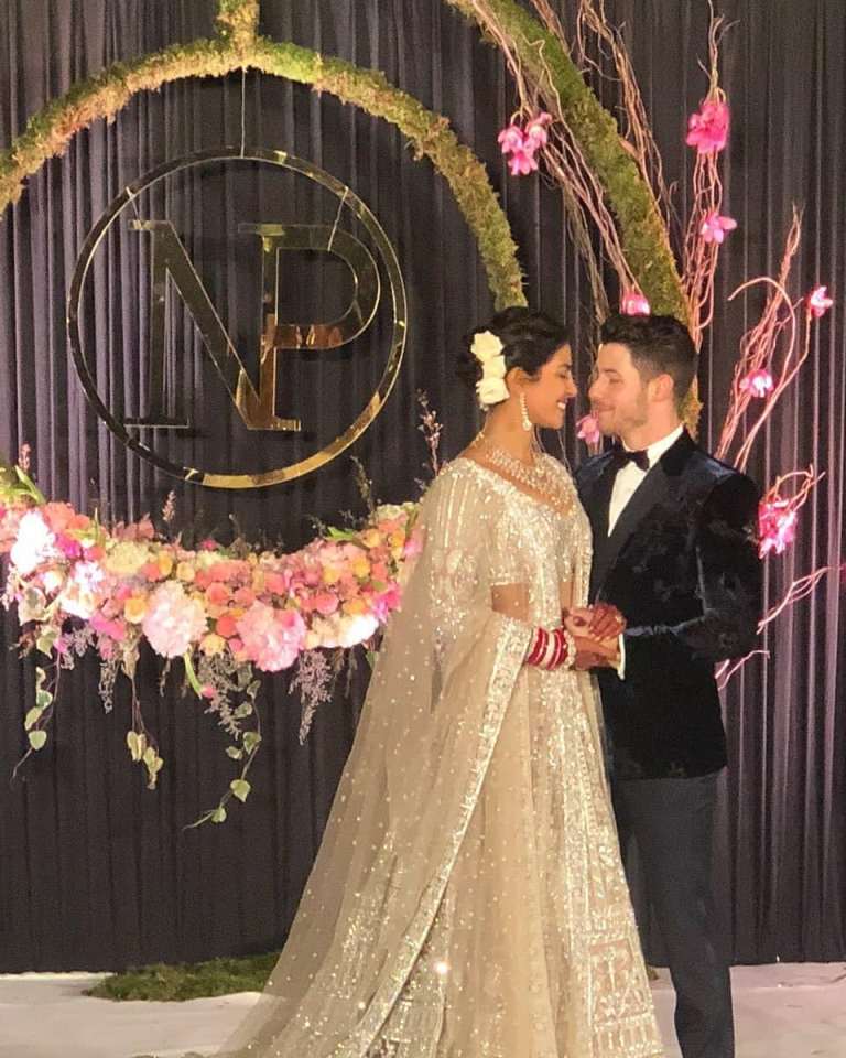 Nickyanka christain ceremony hindu ceremony Ralph Lauren bride groom season Priyanka Chopra Nick Jonas wedding marriage jodhour bollywood Hollywood gown designer party guest wedding dress royal wedding  