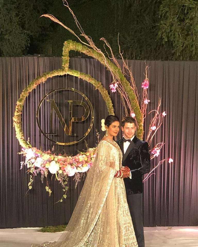 Nickyanka christain ceremony hindu ceremony Ralph Lauren bride groom season Priyanka Chopra Nick Jonas wedding marriage jodhour bollywood Hollywood gown designer party guest wedding dress royal wedding  