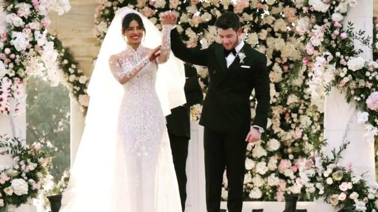 Nickyanka christain ceremony hindu ceremony Ralph Lauren bride groom season Priyanka Chopra Nick Jonas wedding marriage jodhour bollywood Hollywood gown designer party guest wedding dress royal wedding