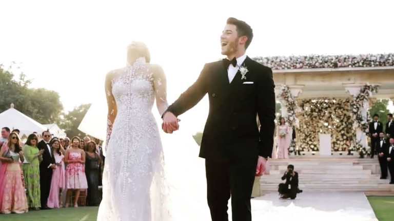 Nickyanka christain ceremony hindu ceremony Ralph Lauren bride groom season Priyanka Chopra Nick Jonas wedding marriage jodhour bollywood Hollywood gown designer party guest wedding dress royal wedding  